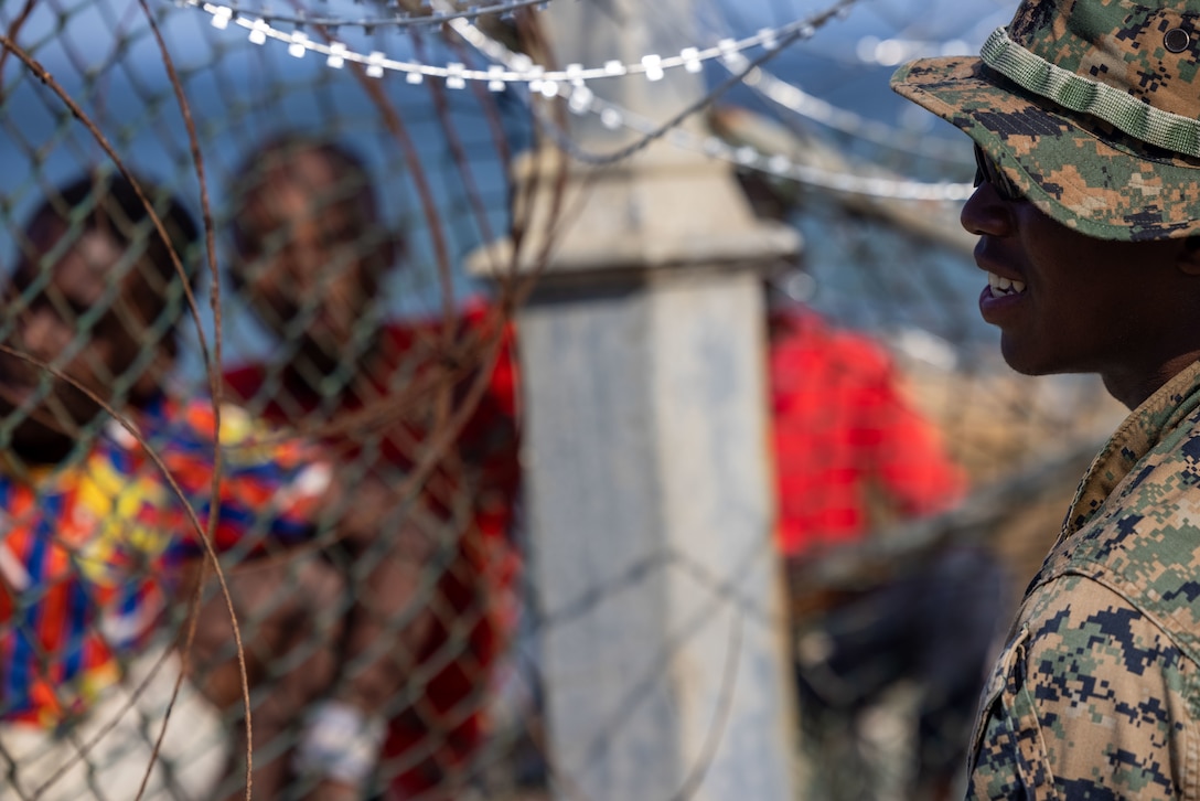 U.S. Marine Corps Pfc. Johvany Moize, a Brooklyn, New York native and machine gunner with 1st Battalion, 8th Marine Regiment, 2d Marine Division, interacts with Haitian children during Continuing Promise 2022 in Jeremie, Haiti, Dec. 12, 2022. 

“I was talking to some of the kids and they were talking to me about how bad Haiti is,” said Moize. “They are proud of who I am and they want to be like me and help people out like I am doing.” 

The Continuing Promise mission includes providing direct medical care and expeditionary veterinary care, conducting training and subject matter expert exchanges on various medical and humanitarian civic assistance topics, and leading seminars on Women, Peace, and Security. 

(U.S. Marine Corps photo by Lance Cpl. Ryan Ramsammy)