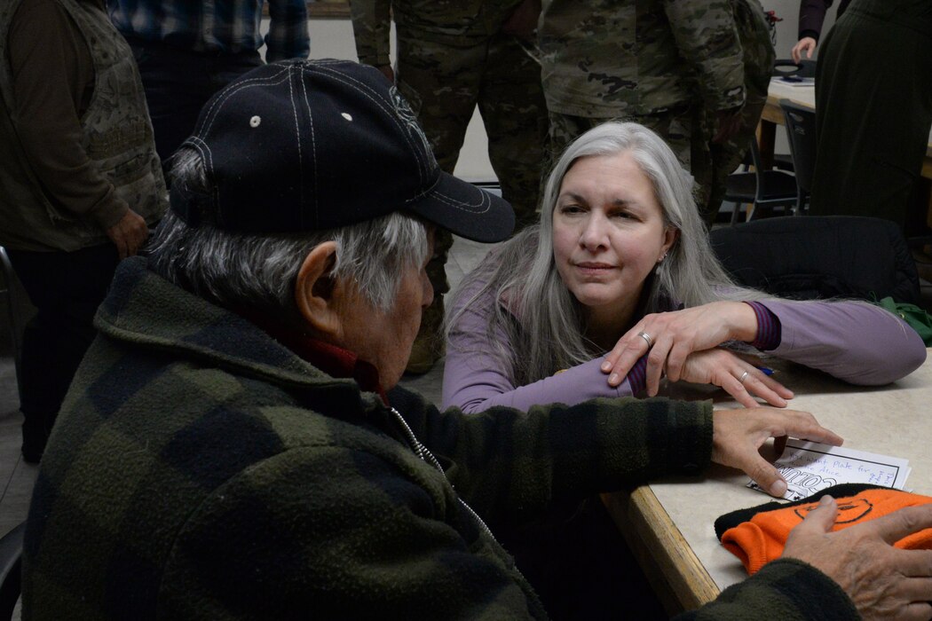 military leaders talk to members of Minto community