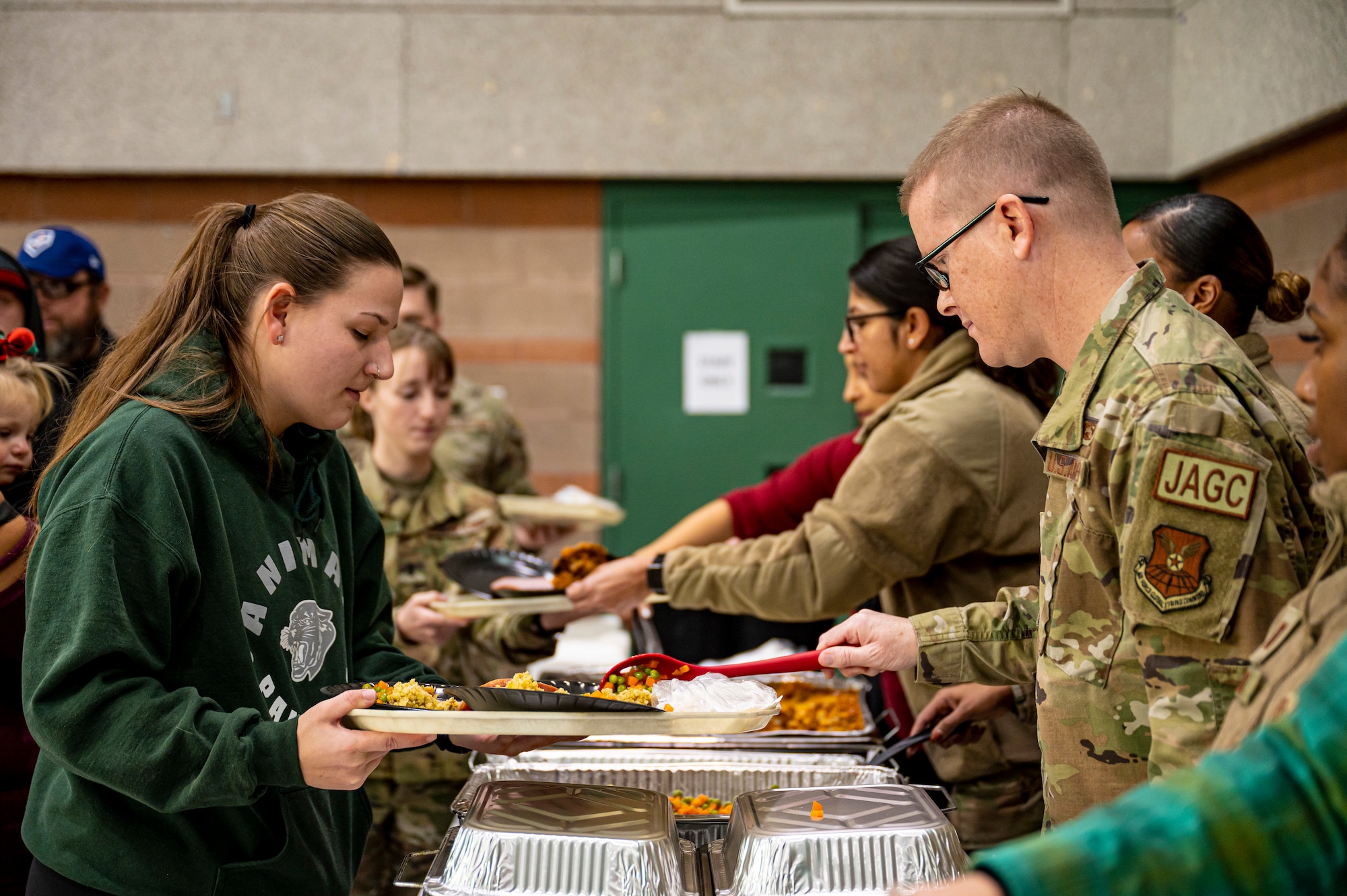 People serve food