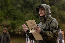 U.S. Marine Corps Staff Sgt. Stephanie Martinez, a supply operations chief with 3rd Sustainment Group (Experimental), 3rd Marine Logistics Group, reviews the safety rules for a rifle range during exercise Winter Workhorse, at Camp Hansen, Okinawa, Japan, Dec. 9, 2022. Winter Workhorse is an annual exercise for CLR-3 to train to carry out mission essential tasks in forward-deployed, austere environments. (U.S. Marine Corps photo by Lance Cpl. Weston Brown)