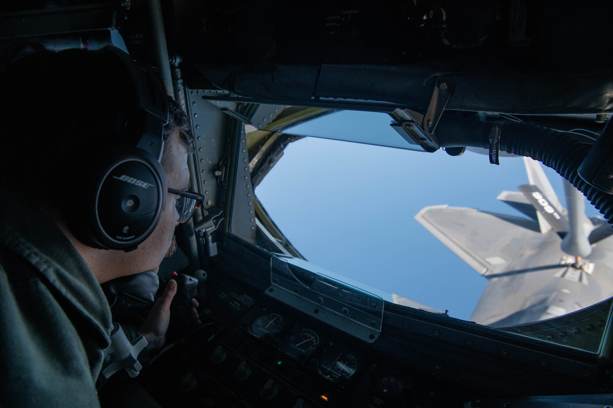 An Airman performs aerial refueling.
