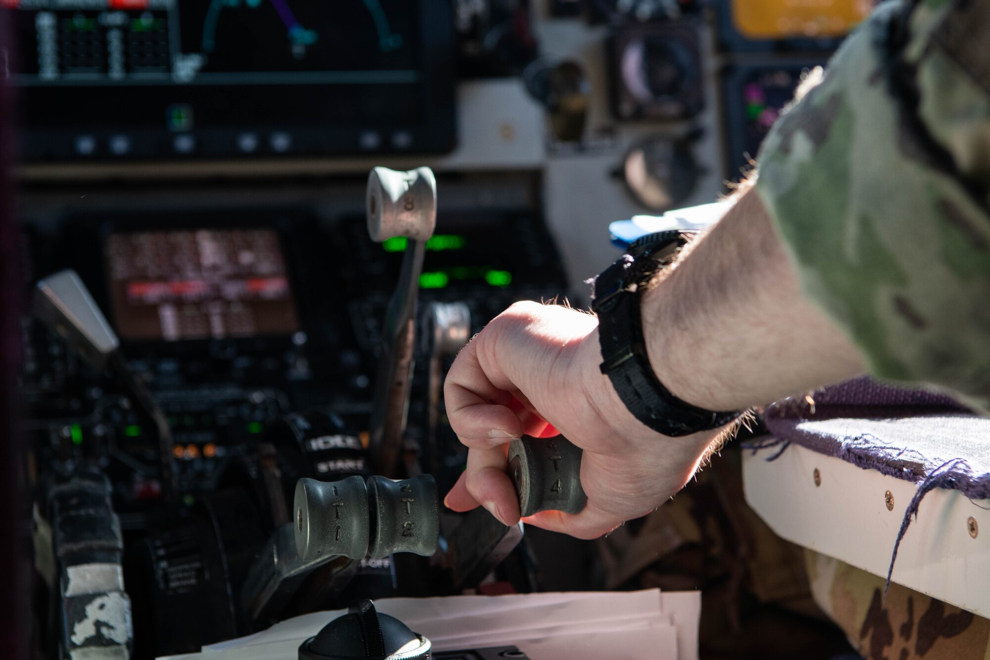 An Airman starts an aircraft's engines.