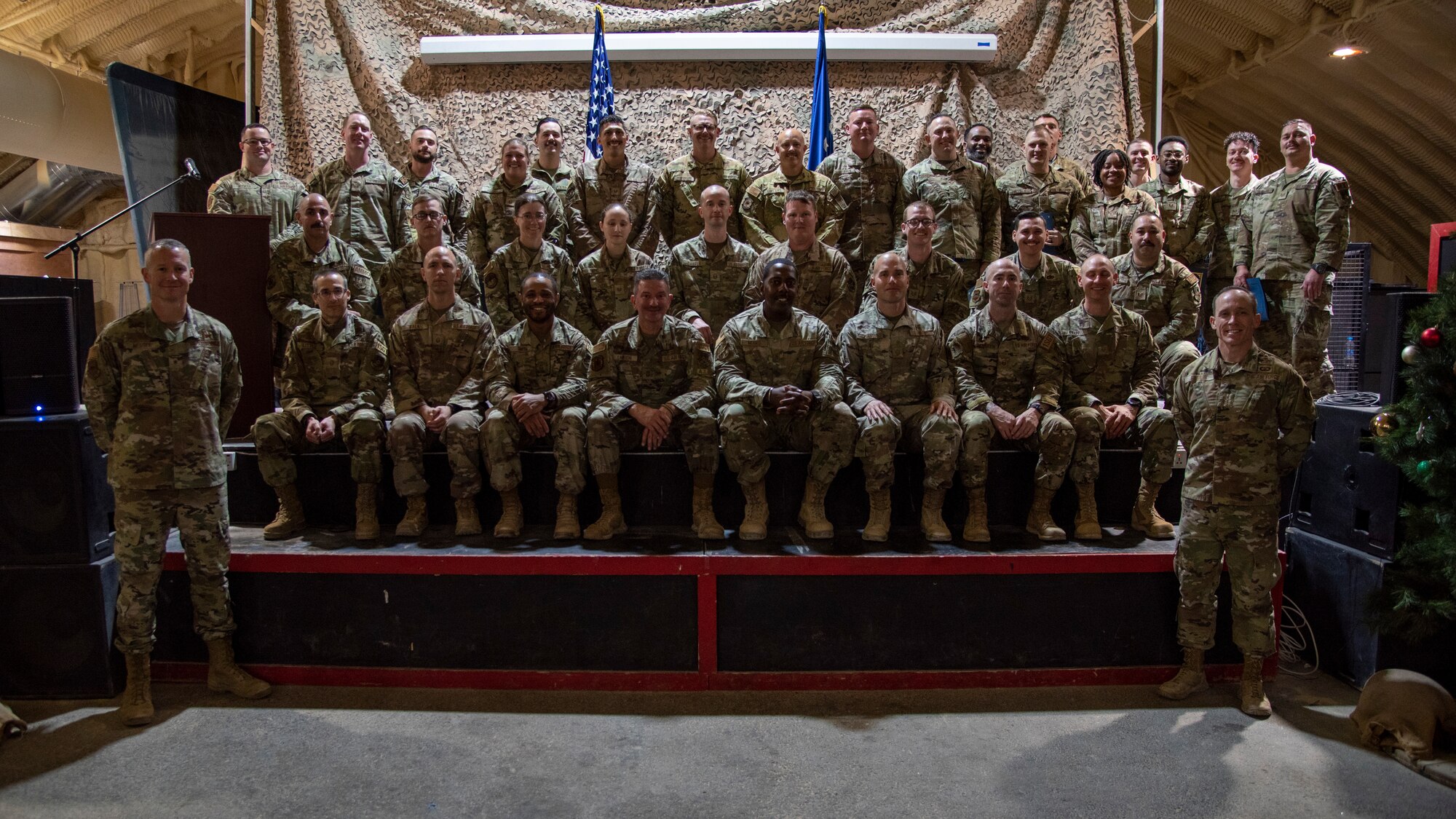 Group photo of the graduating class of First Sergeant Symposium at the 332d Air Expeditionary Wing at an undisclosed location, Southwest Asia, Dec 20, 2022. This class prepared airmen for some of the challenges they may face if assigned to the position. (U.S. Air Force photo by: Tech. Sgt. Jim Bentley)
