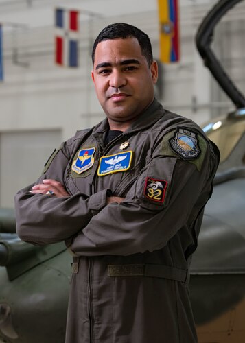 Maj. Aníbal Báez is a pilot in the Dominican Air Force and is currently a partner nation guest instructor for the IAAFA pilot instrument procedures course. Báez has been teaching this course for two years and is honored to be here representing his country while relishing, what he feels, is one of the best experiences a pilot can have. (U.S. Air Force Photo by Staff Sgt. Janiqua P. Robinson)