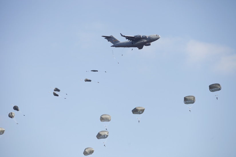 Paratroopers from the U.S. Civil Affairs Command (Airborne) in conjunction with local Fort Bragg and partner nations' airborne organizations, participate in the the Randy Older Memorial Operation Toy drop 2.0, a combined airborne training event at Fort Bragg, NC, held from 4-12 DEC 2022 and designed to increase joint airborne proficiency while enhancing community relations.