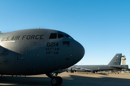 A photo of a C-17 and B-52 on the flightline.