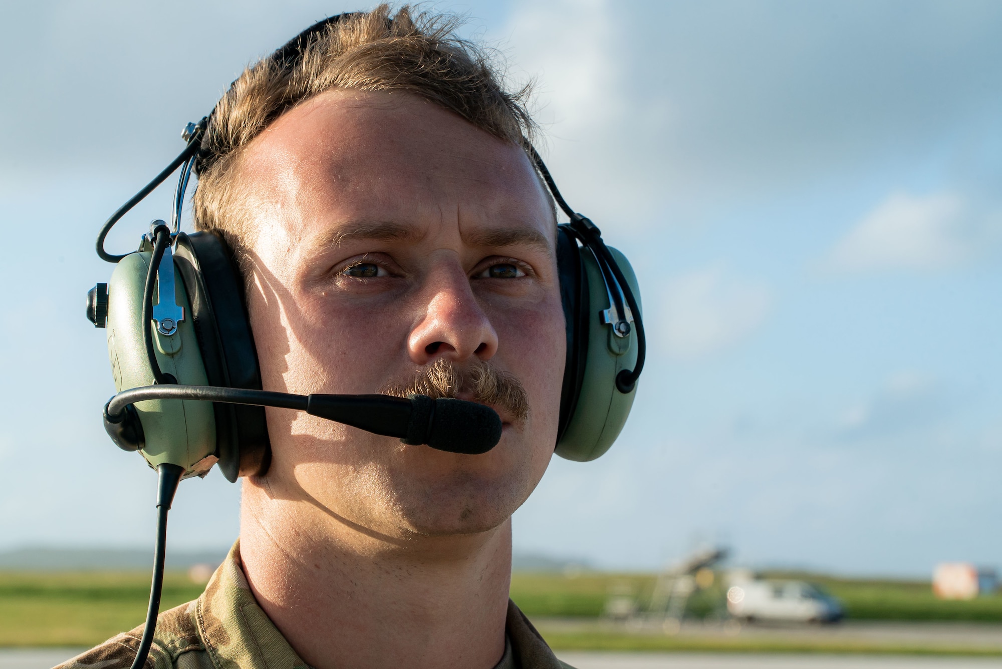 A photo of an Airman on the flightline