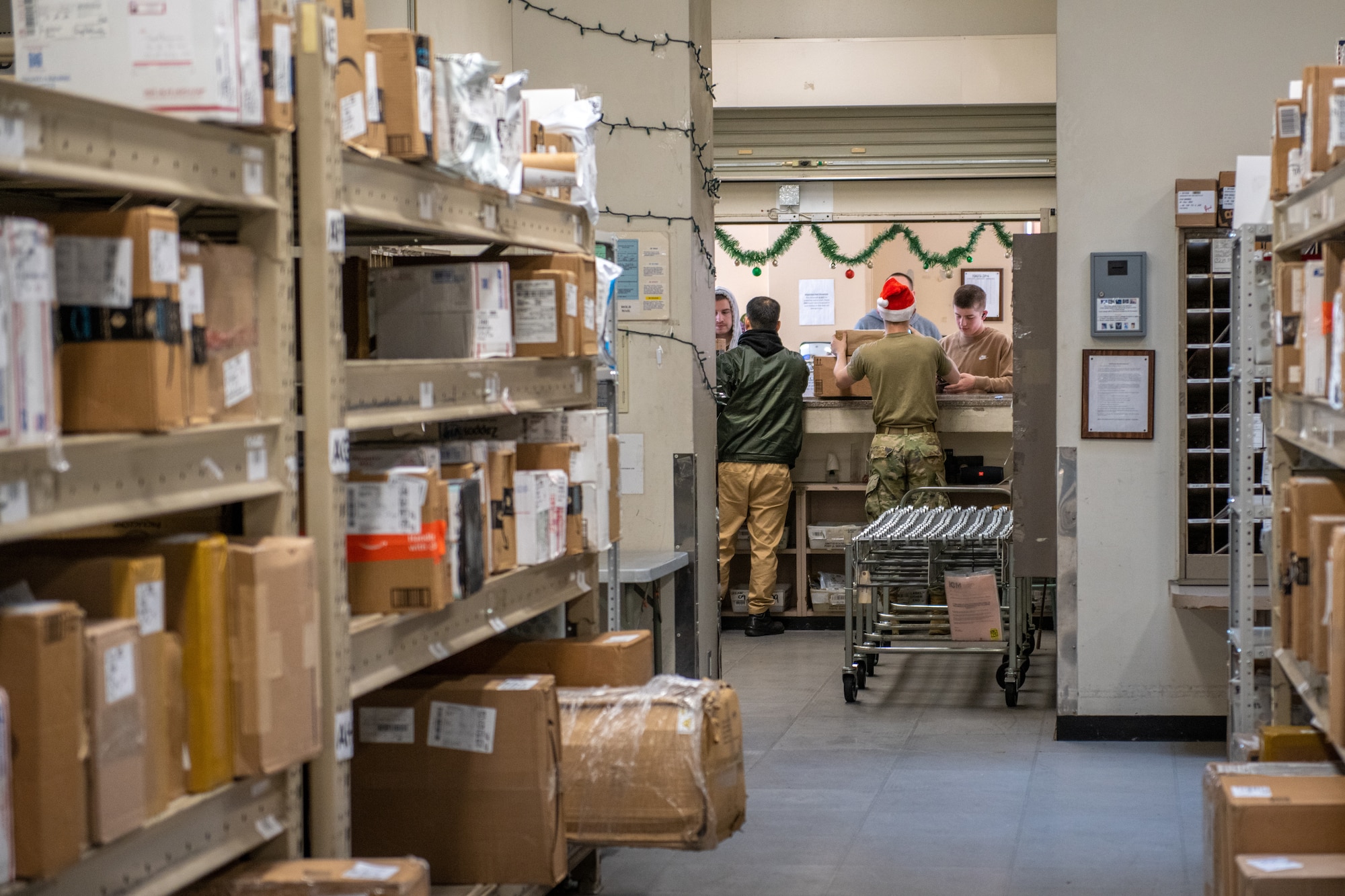 Postal clerks deliver packages to Yokota residents