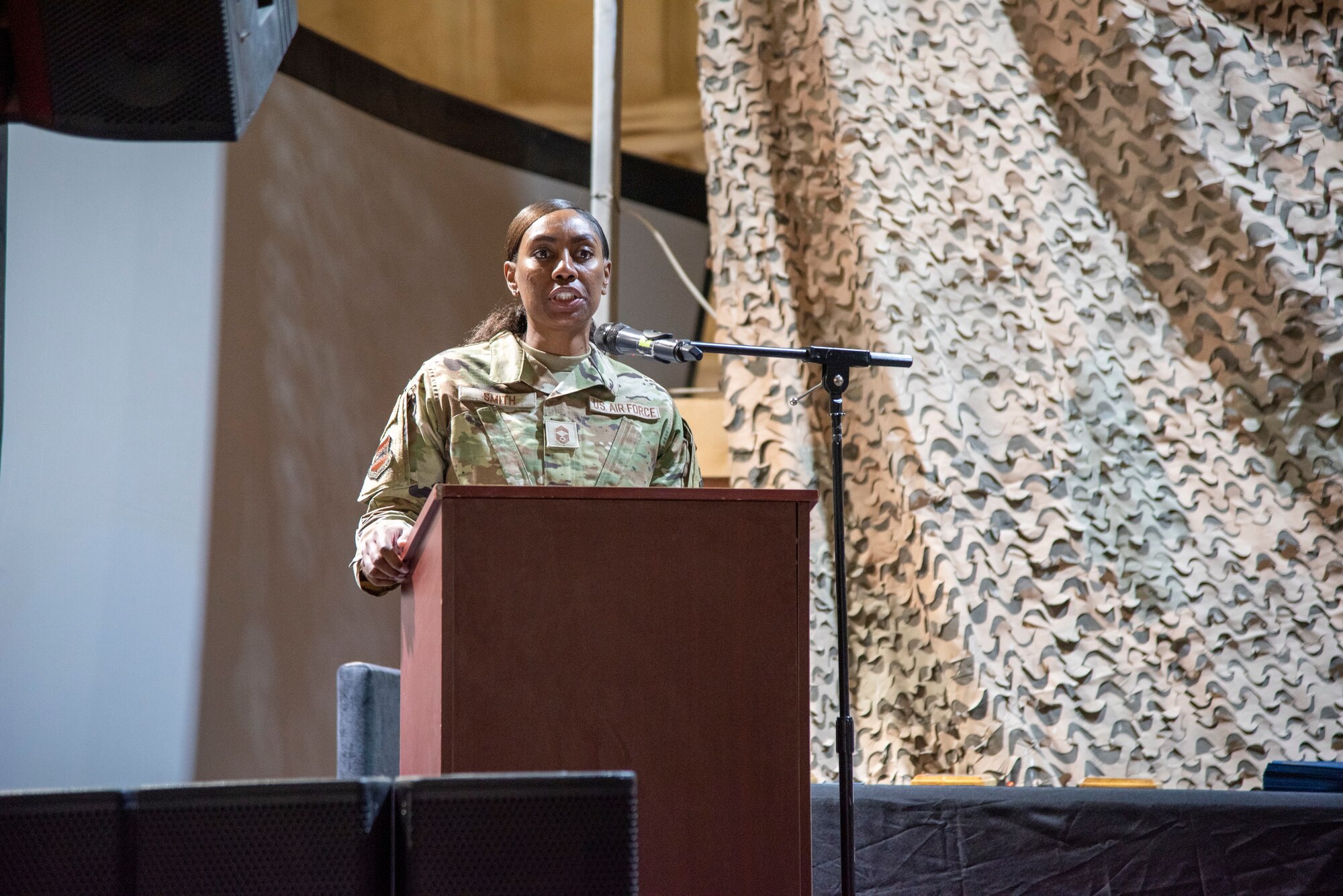 Chief Master Sgt. Keyonna Smith, Logistics and Maintenance Directorate Senior Enlisted Leader, addresses 332d Air Expeditionary Wing Airpower Leadership Academy graduates at an undisclosed location, Southwest Asia, Dec. 22, 2022. ALA is an initiative to enrich the lives of Airmen with education on leadership and quality-of-life issues. (U.S. Air Force photo by: Tech. Sgt. Jim Bentley)