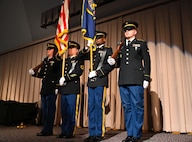 The Utah National Guard Honor Guard presents the colors at the change-of-responsibility ceremony. The Utah Army National Guard welcomes its new command chief warrant officer during a change-of-responsibility ceremony, Dec. 5, 2022, in the Draper headquarters’ auditorium. During the ceremony, Command Chief Warrant Officer 5 Brian Searcy relinquishes the role of command chief of the Utah Army National Guard to Command Chief Warrant Officer 5 William Erickson. (U.S. Army National Guard photo by Staff Sgt. Cambrin Bassett)