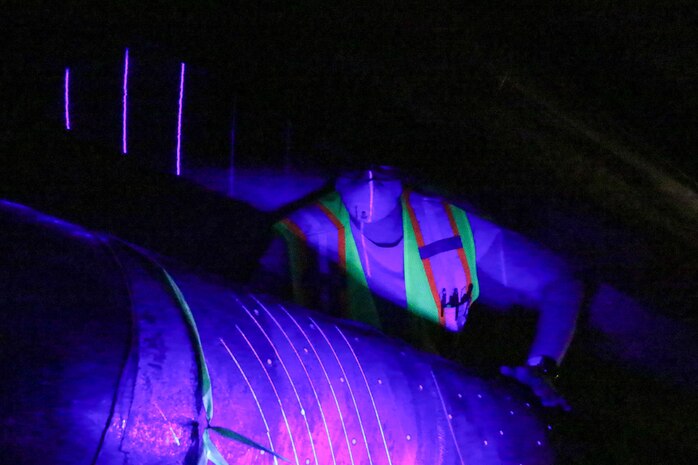 A contracted mechanical and integrity engineer working for Naval Facilities Engineering Systems Command Fleet Logistics Center Pearl Harbor, conducts a three-dimensional scan on to confirm structural integrity of fuel pipes at the Red Hill Bulk Fuel Storage Facility (RHBFSF) in Halawa, Hawaii, Dec. 20, 2022. Joint Task Force-Red Hill was established by the Department of Defense to ensure the safe and expeditious defueling of the RHBFSF. (U.S. Marine Corps Photo by Cpl. Luke Cohen)