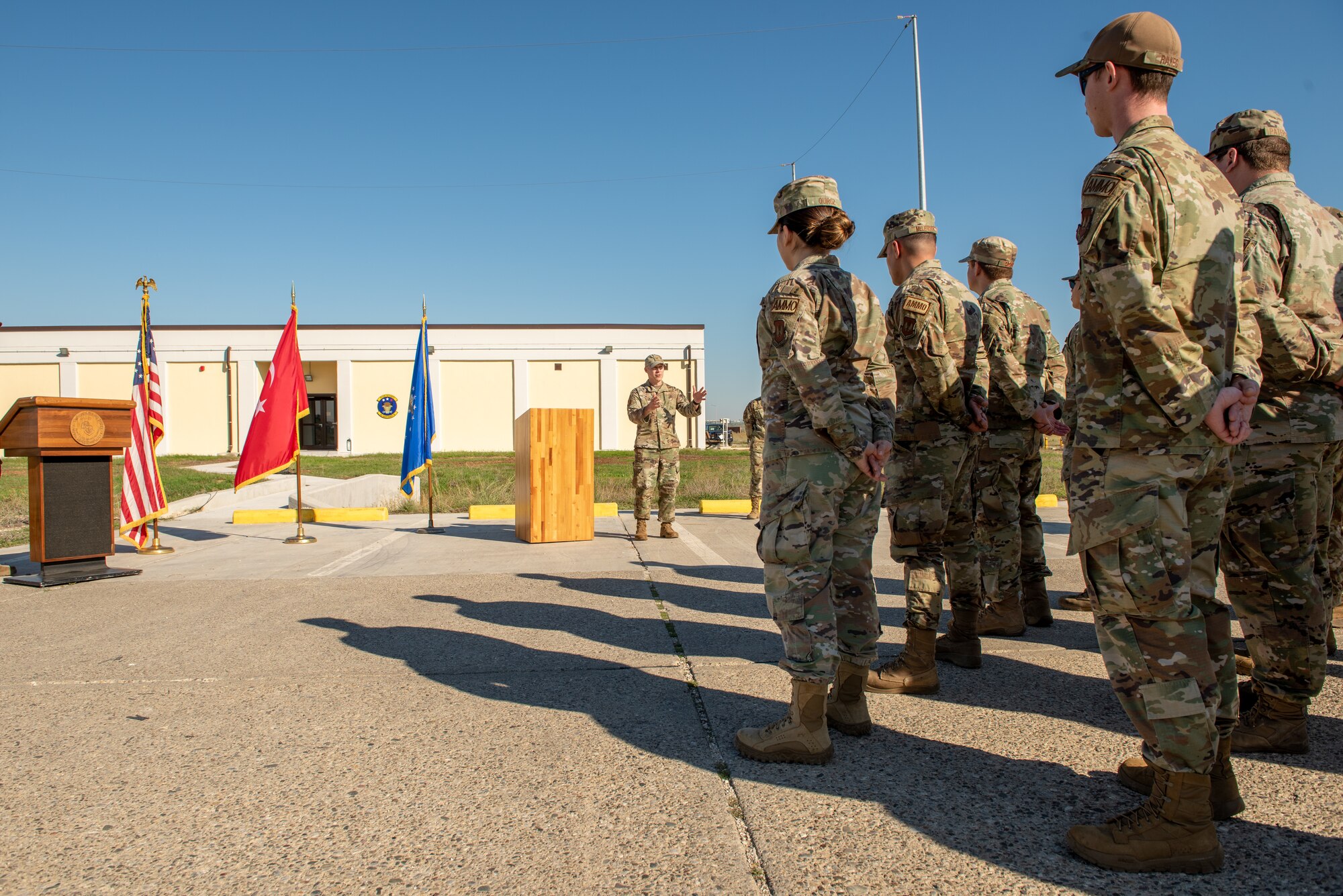 Col. Calvin Powell, 39th Air Base Wing commander, delivers remarks to Airmen assigned to the 39th Maintenance Squadron during the 39th MXS munitions flight building dedication ceremony at Incirlik Air Base, Türkiye, Dec. 19, 2022. The 39th MXS munitions flight building was designed to provide a streamlined means of communication within the ammunitions flight and assist Airmen in building camaraderie and teamwork. The building also provides better protection for munitions assets controlled by the flight and consolidates six sections into a single building, increasing productivity for current and future Airmen. (U.S. Air Force photo by Senior Airman David D. McLoney)