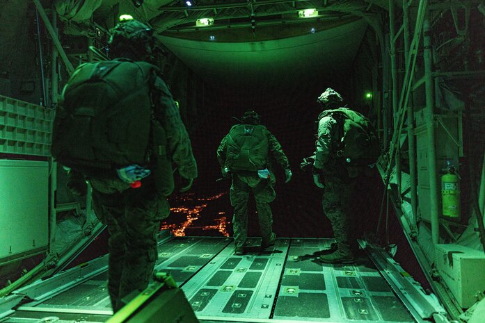 U.S. Marines with the Maritime Special Purpose Force, 26th Marine Expeditionary Unit, conduct a free fall insertion into Marine Corps Auxiliary Landing Field Bogue, North Carolina, Dec. 1, 2022. This was one of multiple training events during a Marine Air Ground Task Force Interoperability Course which provided an evaluation from the Expeditionary Operations Training Group in combining elements of a MAGTF during the intermediate training phase of the 26th MEU pre-deployment training program.