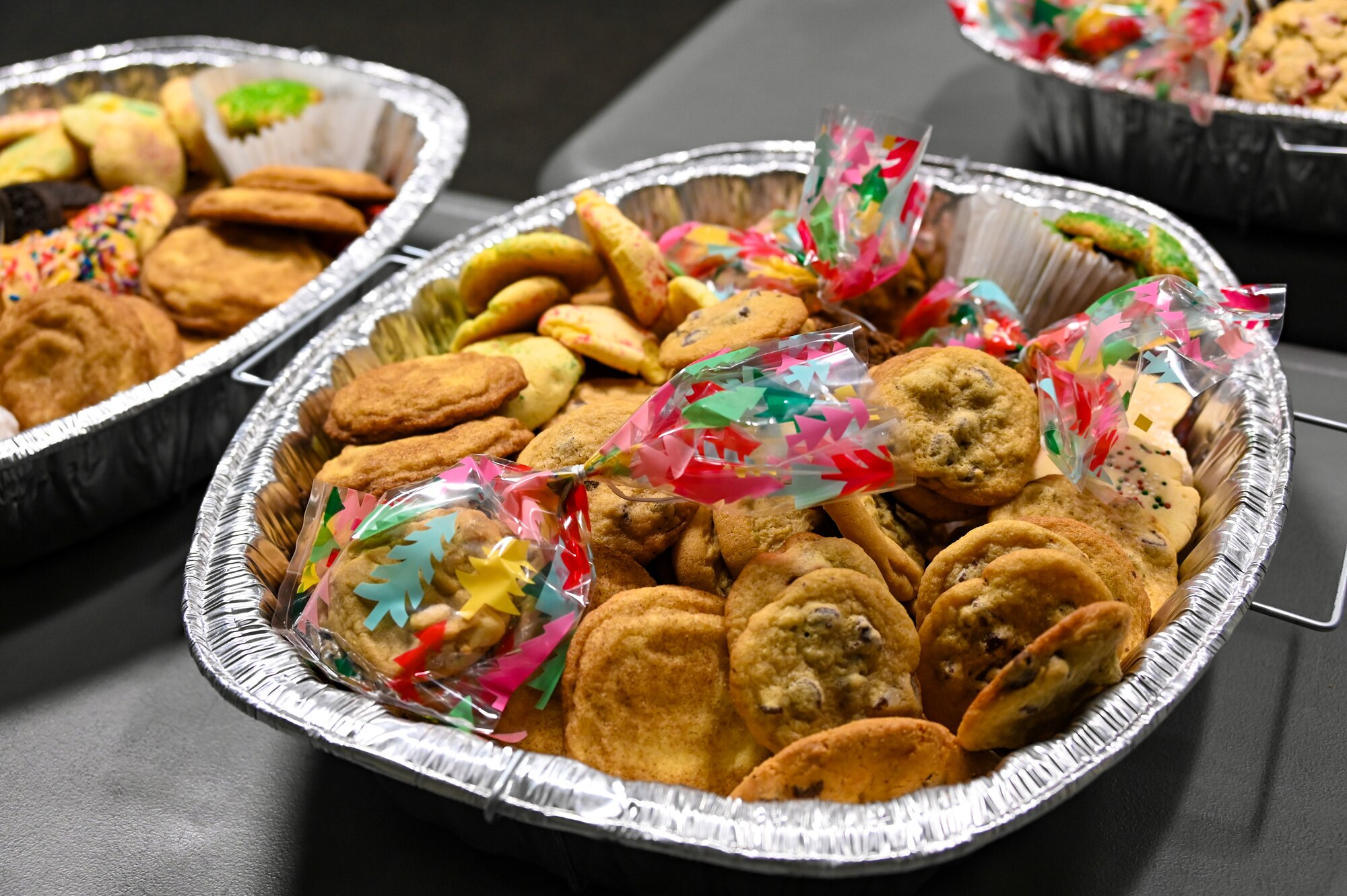 Key Spouses, Volunteers and the local Minot community came together to donate cookies for the Annual Cookie Drive this year, delivering over 9,000 cookies to Airmen on Minot Air Force Base, North Dakota, Dec. 21, 2022. These Airmen sacrifice time away from loved ones to ensure the strategic deterrence mission is carried out. (U.S. Air Force photo by Senior Airman Zachary Wright)