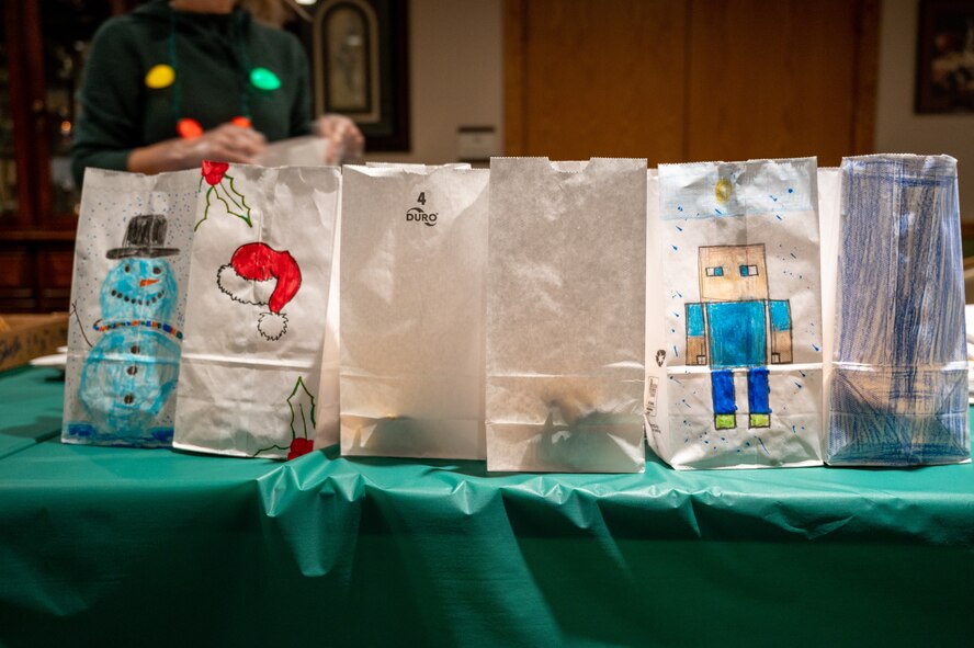 Key Spouses, Volunteers and the local Minot community came together to donate cookies for the Annual Cookie Drive this year, delivering over 9,000 cookies to Airmen on Minot Air Force Base, North Dakota, Dec. 21, 2022. These Airmen sacrifice time away from loved ones to ensure the strategic deterrence mission is carried out. (U.S. Air Force photo by Airman 1st class Alexander Nottingham)