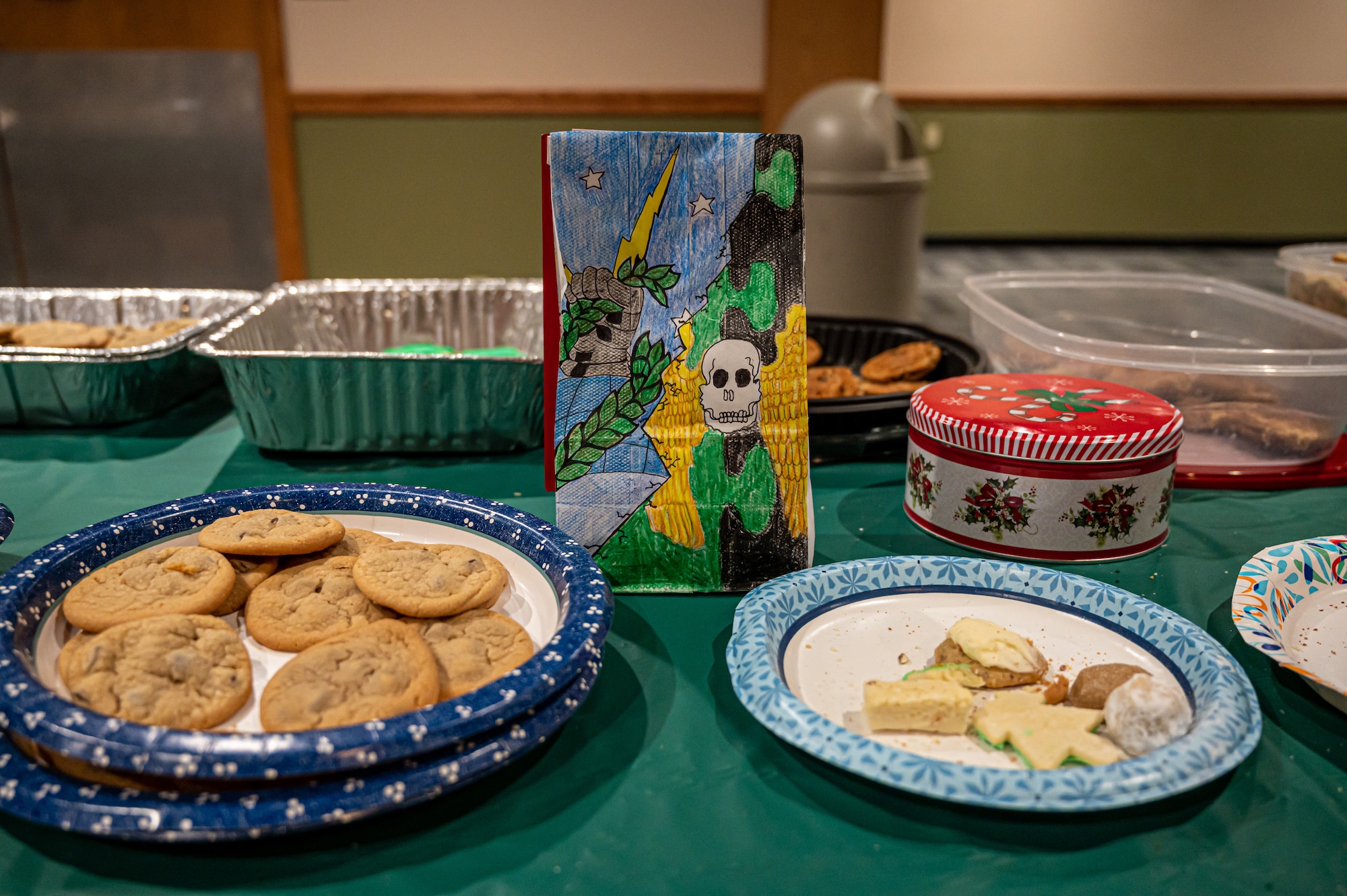 Key Spouses, Volunteers and the local Minot community came together to donate cookies for the Annual Cookie Drive this year, delivering over 9,000 cookies to Airmen on Minot Air Force Base, North Dakota, Dec. 21, 2022. These Airmen sacrifice time away from loved ones to ensure the strategic deterrence mission is carried out. (U.S. Air Force photo by Airman 1st class Alexander Nottingham)