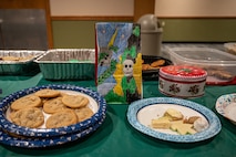 Key Spouses, Volunteers and the local Minot community came together to donate cookies for the Annual Cookie Drive this year, delivering over 9,000 cookies to Airmen on Minot Air Force Base, North Dakota, Dec. 21, 2022. These Airmen sacrifice time away from loved ones to ensure the strategic deterrence mission is carried out. (U.S. Air Force photo by Airman 1st class Alexander Nottingham)