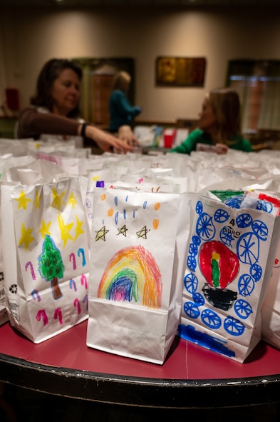 Key Spouses, Volunteers and the local Minot community came together to donate cookies for the Annual Cookie Drive this year, delivering over 9,000 cookies to Airmen on Minot Air Force Base, North Dakota, Dec. 21, 2022. These Airmen sacrifice time away from loved ones to ensure the strategic deterrence mission is carried out. (U.S. Air Force photo by Airman 1st class Alexander Nottingham)