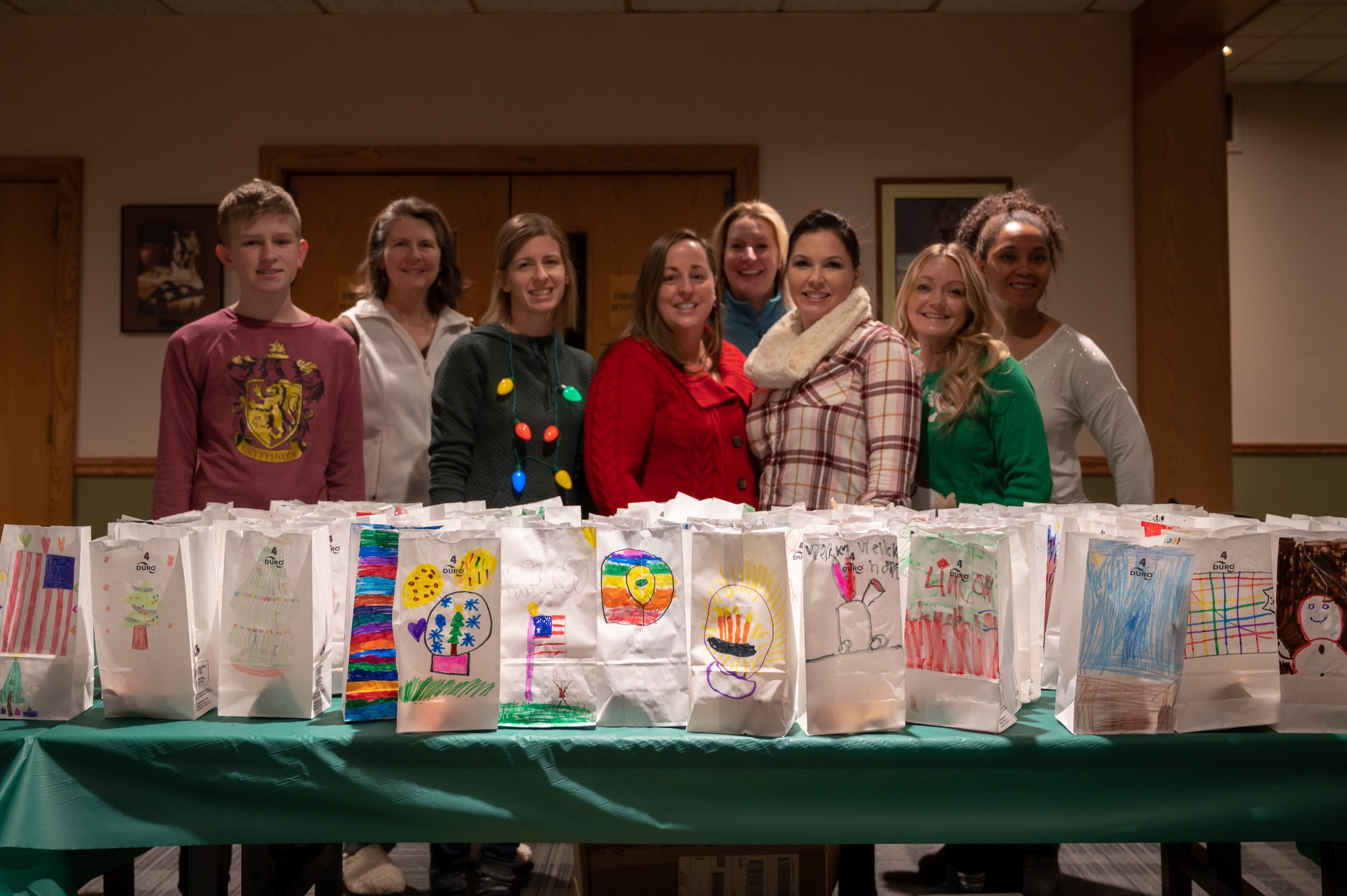 Key Spouses, Volunteers and the local Minot community came together to donate cookies for the Annual Cookie Drive this year, delivering over 9,000 cookies to Airmen on Minot Air Force Base, North Dakota, Dec. 21, 2022. These Airmen sacrifice time away from loved ones to ensure the strategic deterrence mission is carried out. (U.S. Air Force photo by Airman 1st class Alexander Nottingham)