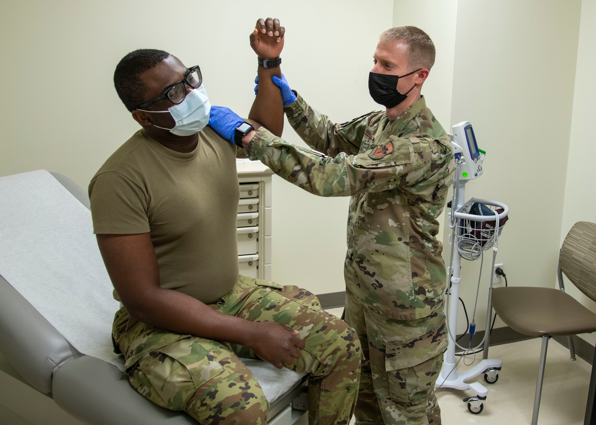 A serviceman is examined at the doctor's office.