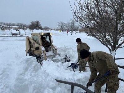 New York Army National Guard Soldiers assigned to the 827th Engineer Battalion clear snow at the Cheektowaga Senior Citizens Center in Cheektowaga, New York, Dec. 26, 2022. The New York National Guard deployed more than 500 Soldiers to western New York following the Christmas weekend snowstorm.
