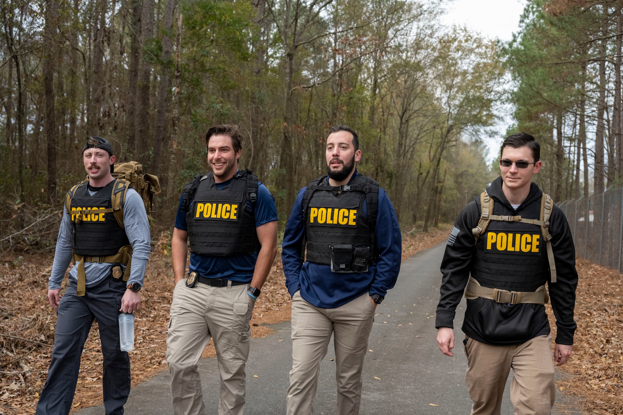 Special Agents assigned to Air Force Office of Special Investigation Detachment 216 participate in a six-mile ruck at Seymour Johnson Air Force Base, North Carolina, Dec. 21, 2022, in remembrance of those who were assigned to Task Force Crimson “Hustler 6” that lost their lives on Dec. 21, 2015. On that day, a suicide bomber detonated an improvised explosive device killing Special Agents Adrianna Vorderbruggen, Michael Cinco, Peter Taub, Chester McBride, and Security Forces defenders Technical Sgt. Joseph Lemm and Staff Sgt. Louis Bonacasa.  (U.S. Air Force photo by Senior Airman Kevin Holloway)