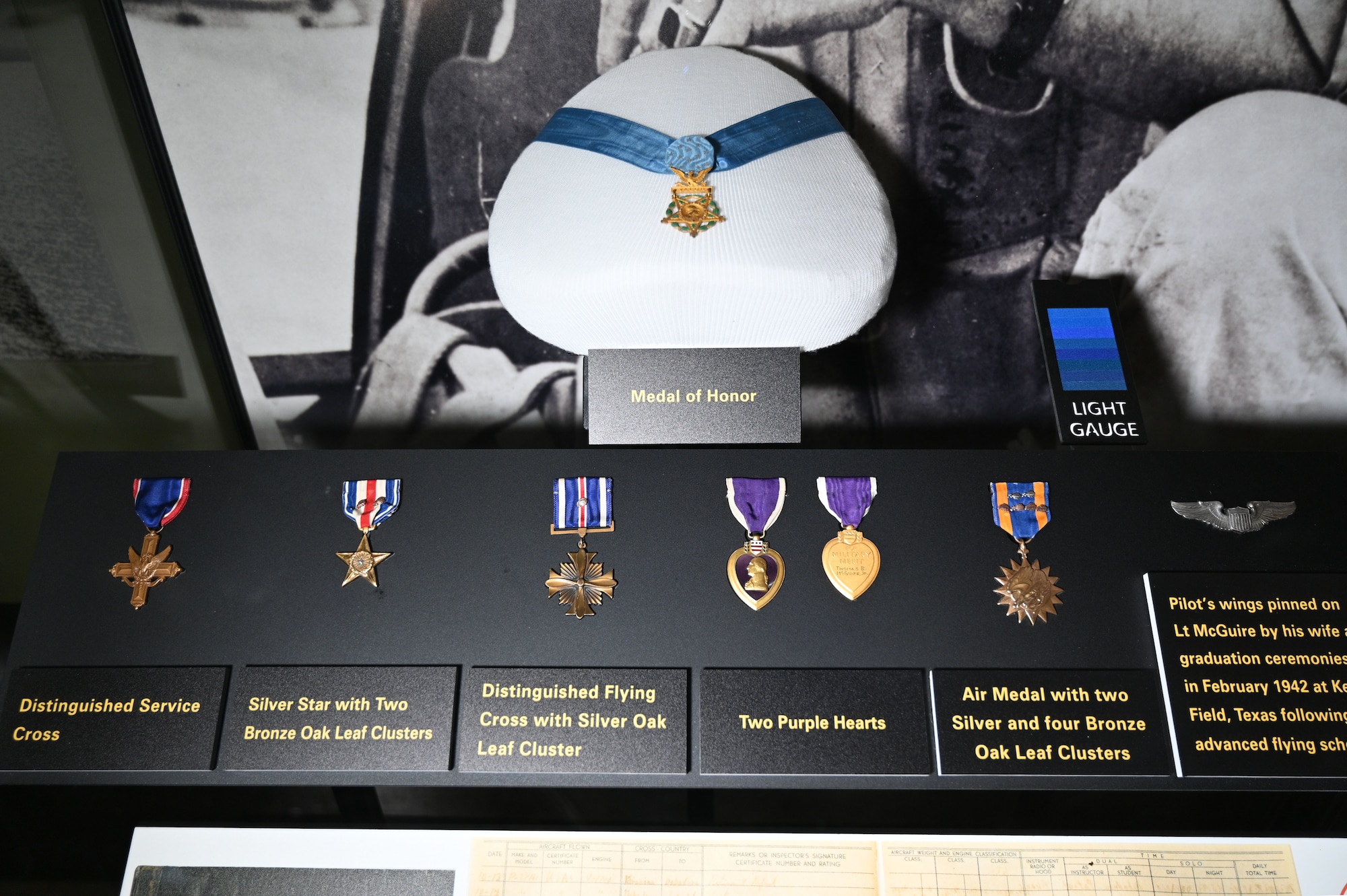 Photo of Maj. Thomas B. McGuire's pilot wings and air medals to include the Medal of Honor from WWII.