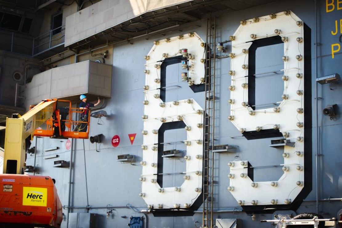 Airman Tyler Heston, from Fairfield, Iowa, sands a water brake cylinder aboard the Nimitz-class aircraft carrier USS Dwight D. Eisenhower (CVN 69). Ike is currently pierside at Norfolk Naval Shipyard in the basic phase of the optimized fleet response plan (OFRP). (U.S. Navy photo by Mass Communication Specialist 3rd Class Merissa Daley/Released)