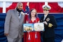 From left to right: Norfolk Naval Shipyard Apprentice Director Colby Tynes, 2022 Apprentice valedictorian and Shop 31 Inside Machinist Linda Matthews, and Shipyard Commander Capt. Dianna Wolfson.