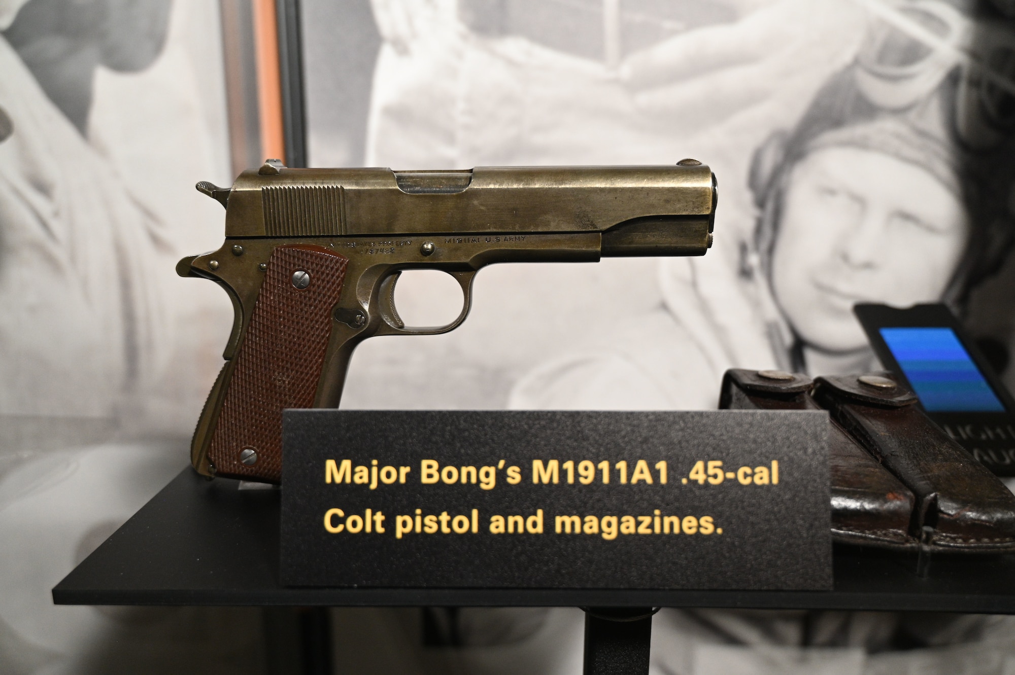 M1911A1 .45-cal Colt pistol and magazines belonging to Maj. Richard I. Bong on display in the WWII Gallery at the National Museum of the U.S. Air Force.