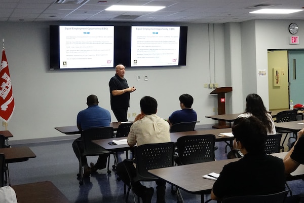 Stephen Brown, U.S. Army Corps of Engineers, Far East District Equal Employment Opportunity (EEO) manager, discusses topics with District employees during EEO training. Brown won the 2022 Secretary of Army EEO Professional of the Year award for his significant contributions to the U.S. Army Corps of Engineers EEO and Diversity, Equity, Inclusion, and Accessibility program and initiatives within the region. (U.S. Army photo by Far East District)