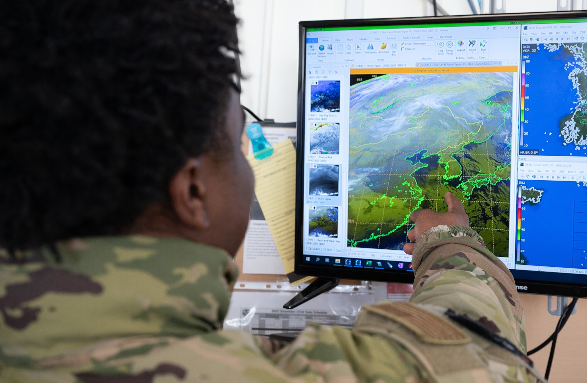 Senior Airman Patrick Bell, 8th Operations Support Squadron weather forecaster, follows a weather model at Kunsan Air Base, Republic of Korea, Dec. 27, 2022. Models assist the weather flight in gathering information to predict future forecasts. extending beyond 30 hours. (U.S. Air Force photo by Staff Sgt. Sadie Colbert)