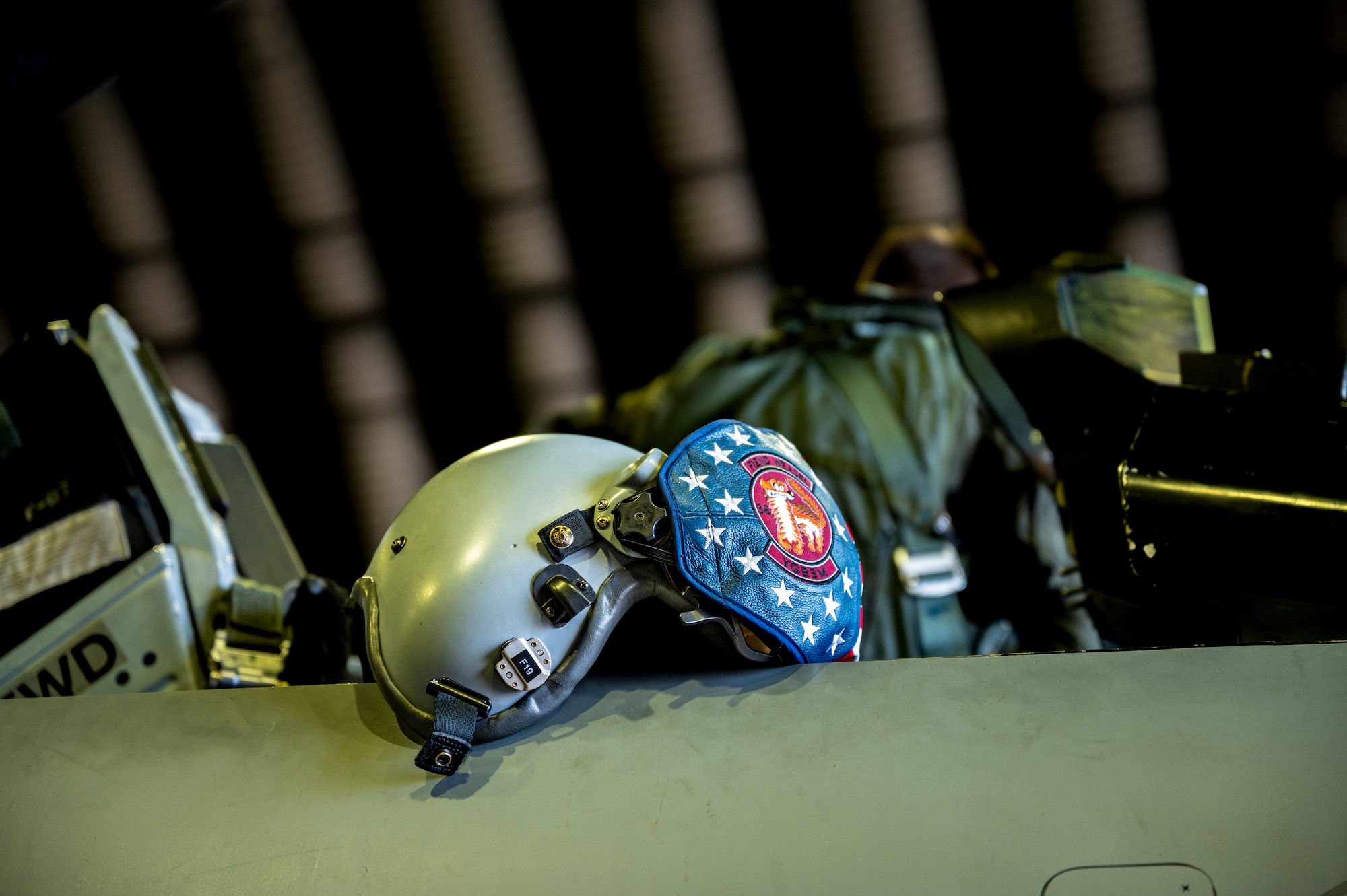 U.S. Air Force Capt. Trevor Schmidt, 36th Fighter Squadron (FS) pilot’s HGU-55 helmet sits on the top of an F-16 Fighting Falcon before a training mission at Osan Air Base, Republic of Korea, Dec. 28, 2022.