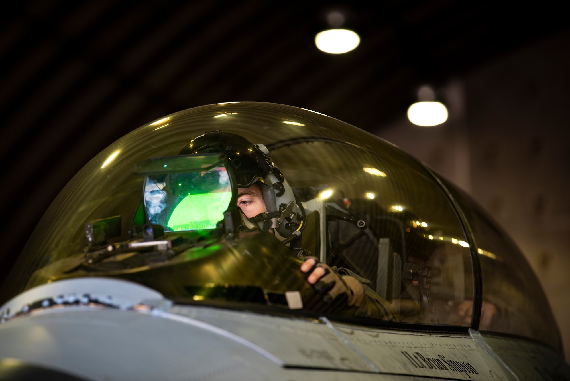 U.S. Air Force Capt. Trevor Schmidt, 36th Fighter Squadron (FS) pilot, performs pre-flight checks on an F-16 Fighting Falcon before a training mission at Osan Air Base, Republic of Korea, Dec. 28, 2022.