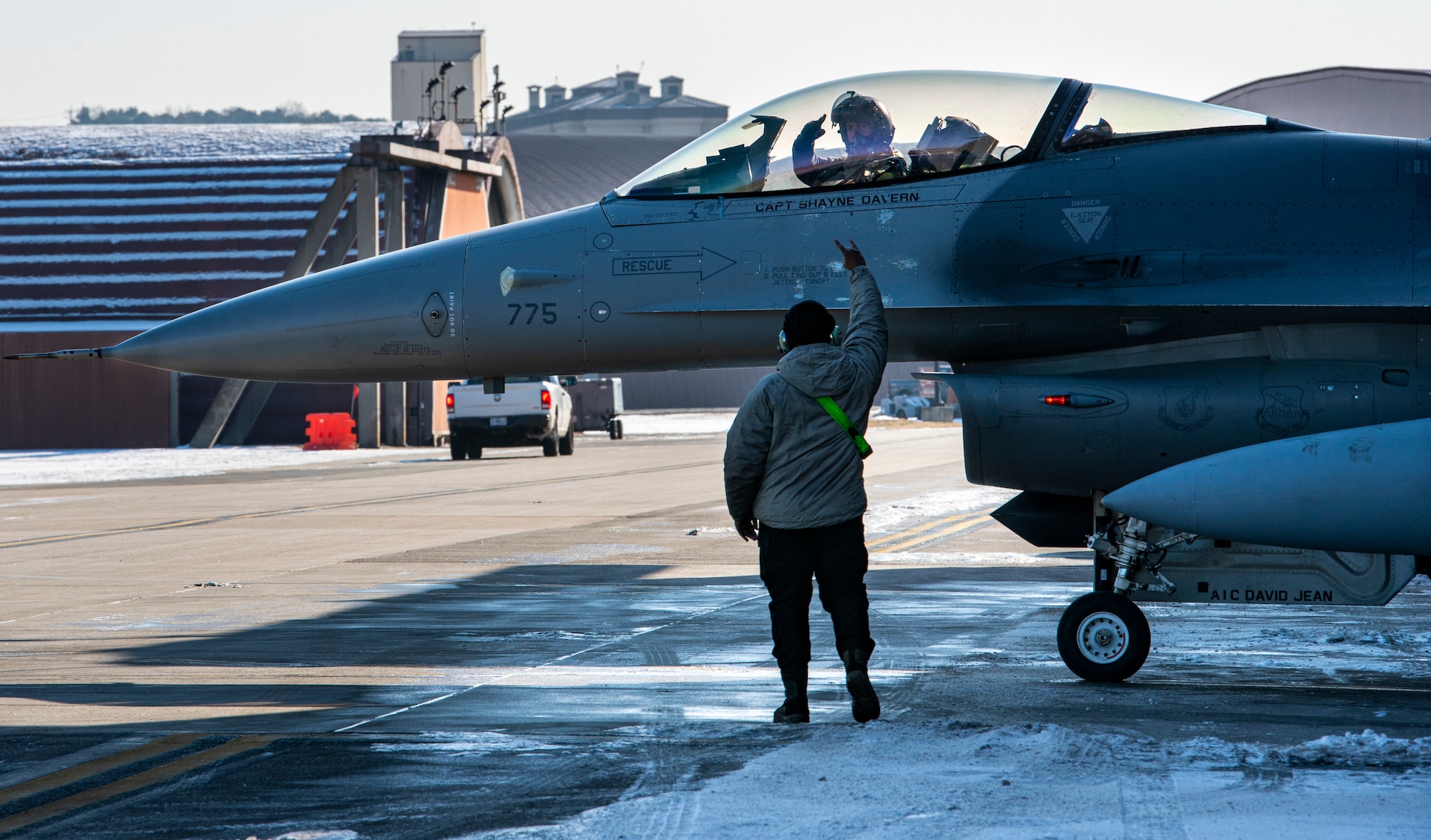 U.S Air Force Maj. Nicolas DeWulf, 36th Fighter Squadron pilot waves as he taxis in an F-16 Fighting Falcon before a training mission at Osan Air Base, Republic of Korea, Dec. 28, 2022.