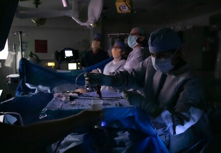 040622-N-EI119-1124 ATLANTIC OCEAN (Jun. 04, 2022) Hospital Corpsman 3rd Class Cheyenne Taunah delivers an appendix to LT Courtney Ballou during an appendectomy aboard the aircraft carrier USS George H. W. Bush (CVN 77) Jun. 04, 2022. The George H.W. Bush Carrier Strike Group (CSG) is underway completing a certification exercise to increase U.S. and allied interoperability and warfighting capability before a future deployment. The George H.W. Bush CSG is an integrated combat weapons system that delivers superior combat capability to deter, and if necessary, defeat America's adversaries in support of national security. Carrier Air Wing (CVW) 7 is the offensive air and strike component of CSG-10 and the George H.W. Bush CSG. The squadrons of CVW-7 are Strike Fighter Squadron (VFA) 143, VFA-103, VFA-86, VFA-136, Electronic Attack Squadron (VAQ) 140, Carrier Airborne Early Warning Squadron (VAW) 121, HSC-5, and Helicopter Maritime Strike Squadron (HSM) 46. (U.S. Navy photo by Mass Communication 3rd Class Ryan Hartman)