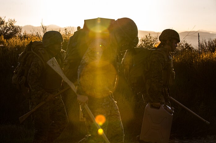 U.S. Marines with I Marine Expeditionary Force Information Group, run during a martial arts instructor course physical training session at Marine Corps Base Camp Pendleton, California, Dec. 8, 2022. MAI courses certify Marines to instruct and monitor Marine Corps Martial Arts Program training and advance Marines in the program, distinguishing their levels of experience with different colored belts.
