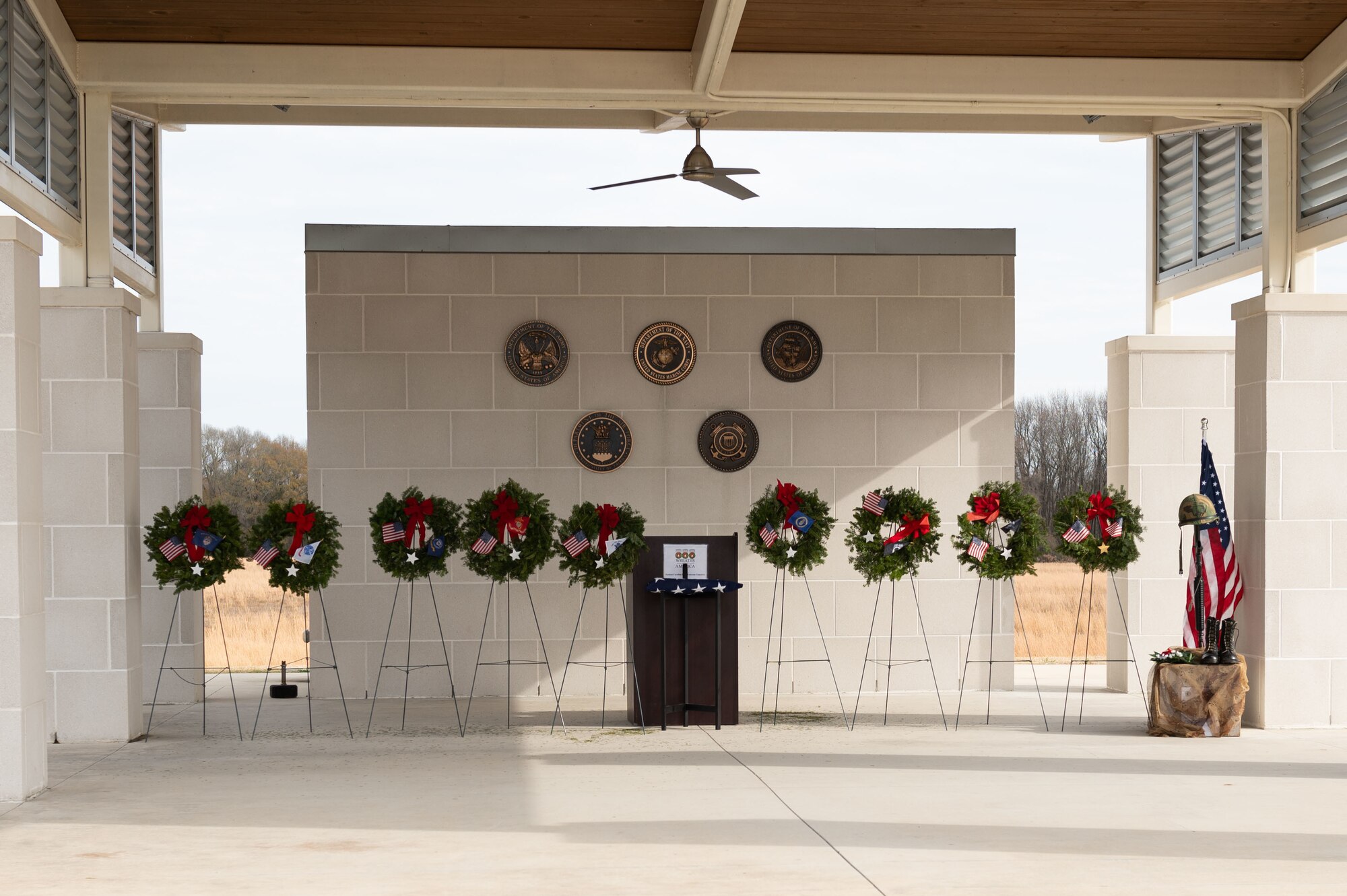 Wreaths honoring Prisoners of War and service members missing in action from each branch of service, are on display during Wreaths Across America at Eastern Carolina Veterans Cemetery, Goldsboro, North Carolina, Dec. 17, 2022. Wreaths Across America provides wreaths annually to honor and remember fallen service members during the holiday season. (U.S. Air Force photo by Airman 1st Class Rebecca Sirimarco-Lang)