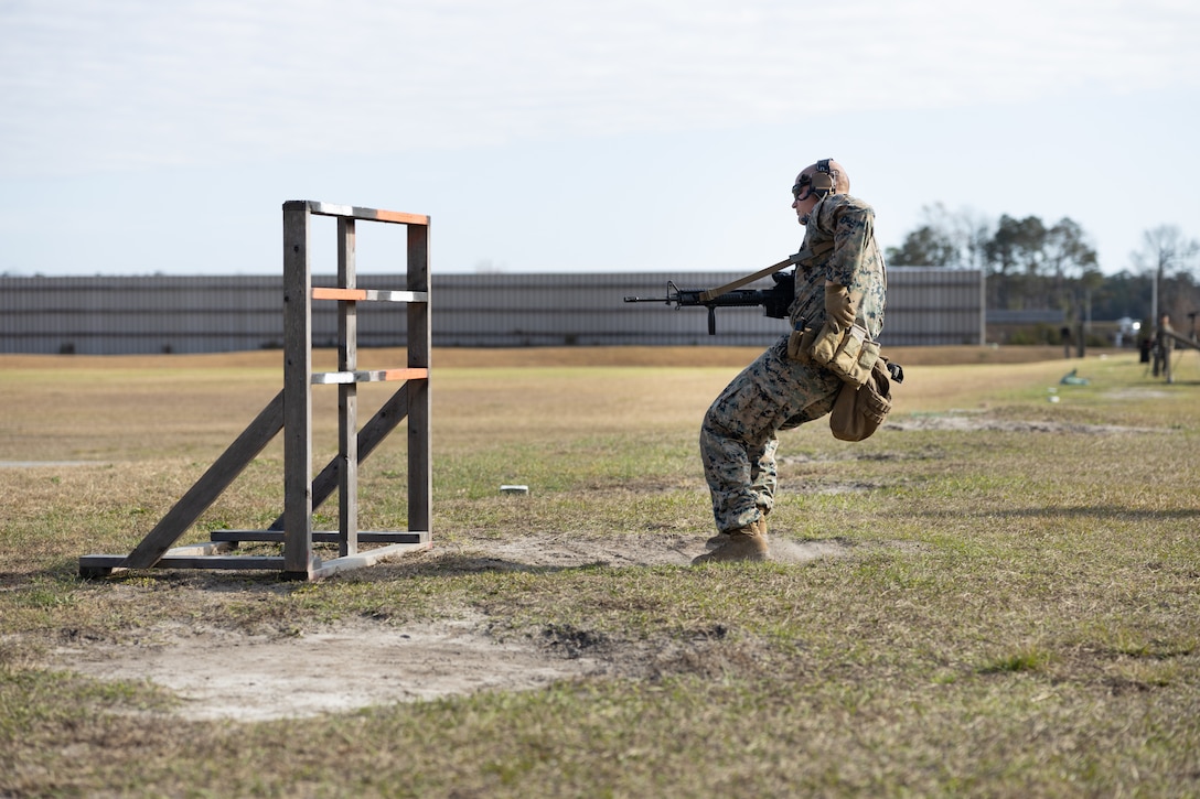 U.S. Marine Corps 1st Lt. Dryden Phelps, the Alpha range Officer in Charge with Weapons Training Battalion, participates in the final stage of the Intramural Marksmanship Competition on Stone Bay, Marine Corps Base Camp Lejeune, North Carolina, Dec. 7, 2022. The Marine Corps Intramural Marksmanship Competition inspires unit cohesion and mission readiness by allowing Marines to compete and improve lethality with both rifle and pistol weapons. (U.S. Marine Corps photo by Cpl. Antonino Mazzamuto)