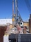 Drilling for secant pile installation on Berth 11 as part of Portsmouth Naval Shipyard’s Multi-Mission Dry Dock #1 construction.