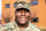 Capt. Anthony McClain, the Illinois National Guard Director of Diversity and Inclusion, chats with Capt. Crystal Rodrigues, the State Partnership Program Director and International Affairs Officer, in their office at the Illinois National Guard Joint Force Headquarters on Camp Lincoln in Springfield, Ill Dec. 29, 2022. (U.S. Army photo by Sgt. Trenton Fouche, Joint Force Headquarters - Illinois National Guard)