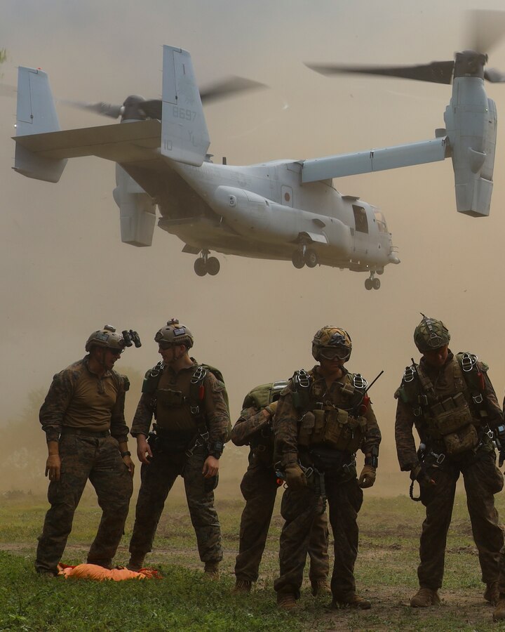 INDONESIA (Dec. 18, 2022) - U.S. Marines with Maritime Raid Force, 13th Marine Expeditionary Unit, wait to board an MV-22 as part of a freefall exercise during Cooperation Afloat Readiness and Training/ Marine Exercise (MAREX) Indonesia 2022, Dec. 18. CARAT/MAREX Indonesia is a bilateral exercise between Indonesia and the United States designed to promote regional security cooperation, maintain and strengthen maritime partnerships, and enhance maritime interoperability. In its 28th year, the CARAT series is comprised of multinational exercises, designed to enhance U.S. and partner navies’ and marine corps abilities to operate together in response to traditional and non-traditional maritime security challenges in the Indo-Pacific region (U.S. Marine Corps photo by Cpl. Austin Gillam)