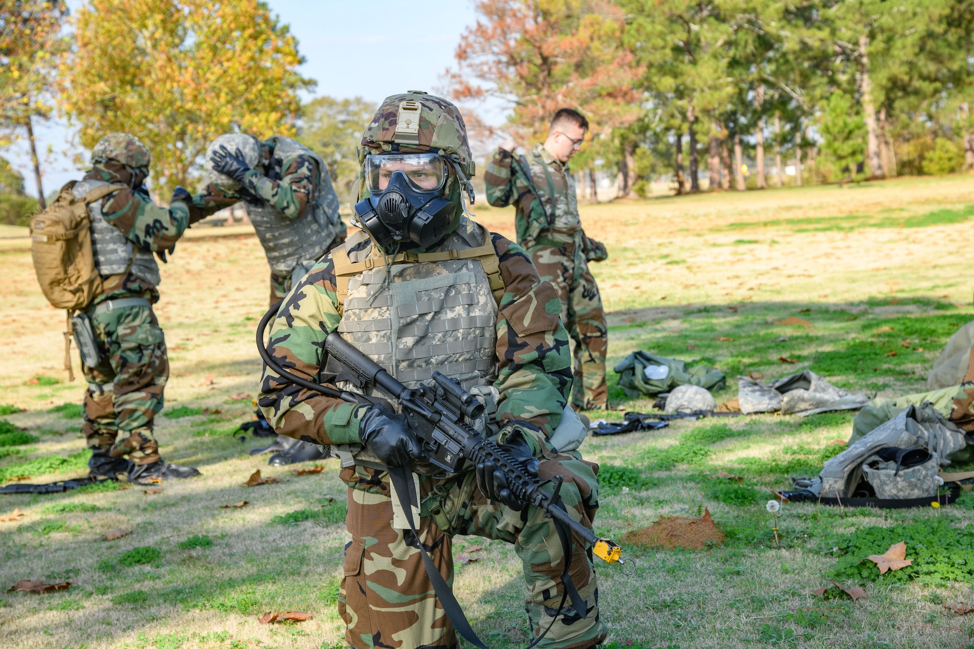 Airmen dressed in level 4 Mission Oriented Protective Posture gear at Maxwell Air Force Base, December 8, 2022. The exercise focused on training for the next fight and preparing Airmen to support different functional areas within the Mission Support Group.