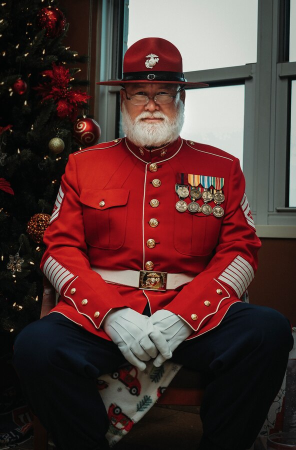 Gunny Claus, commanding officer of the 1st Reindeer Division, Tactical Sled Group, poses for a photo during a Christmas party for Headquarters Battalion, 2d Marine Division, on Camp Lejeune, North Carolina, Dec. 15, 2022.



“I do it to spend time with my younger brothers and sisters,” said Gunny Claus. “I love my job and I wouldn’t have it any other way.”