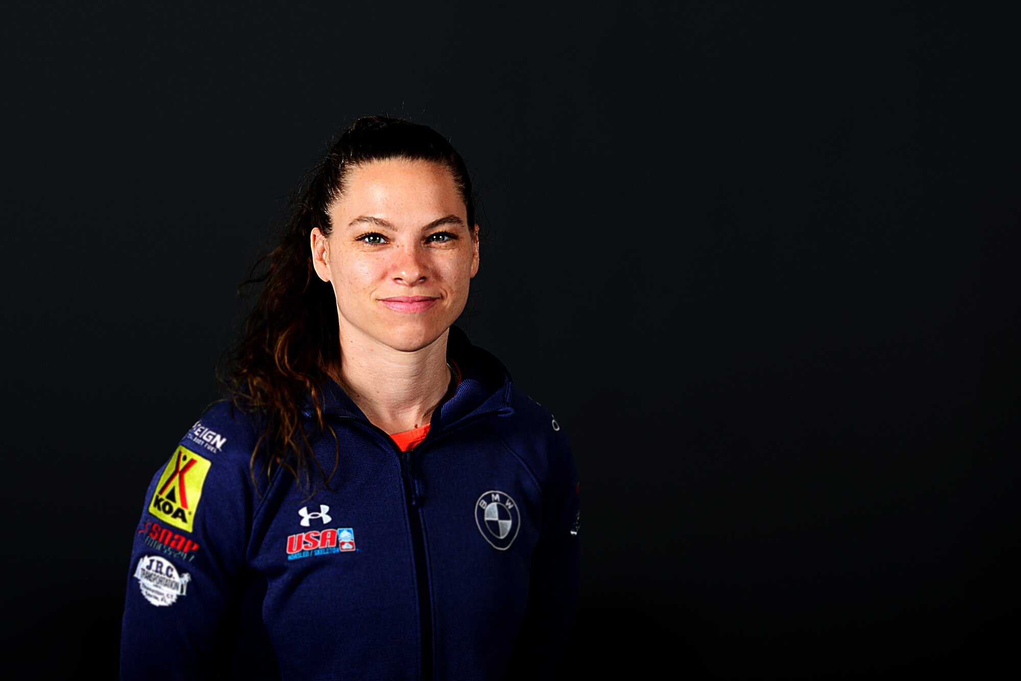 Airman 1st Class Kelly Curtis, U.S. Air Force world class athlete, poses for a photo at Aviano Air Base, Italy, Jan. 18, 2022. Curtis is a member of the 2022 Beijing Olympics. (U.S. Air Force photo by Senior Airman Noah Sudolcan)