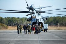 Secretary of the Navy Carlos Del Toro exits a CH-53K Super Stallion at Marine Corps Auxiliary Landing Field (MCALF) Bogue, North Carolina, Jan. 27, 2022. While at MCALF Bogue, Del Toro met with II Marine Expeditionary Force leadership and observed an Expeditionary Advanced Based Operations demonstration in an effort to become acquainted with II MEF capabilities. (U.S. Marine Corps photo by Lance Cpl. Jacob Bertram)