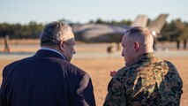 Secretary of the Navy Carlos Del Toro speaks with Lt. Gen. William Jurney, II Marine Expeditionary Force Commanding General, while at Marine Corps Auxiliary Landing Field (MCALF) Bogue, North Carolina, Jan. 27, 2022. While at MCALF Bogue, Del Toro met with Marine Corps leaders and observed an Expeditionary Advanced Based Operations demonstration. (U.S. Marine Corps photo by Lance Cpl. Jacob Bertram)