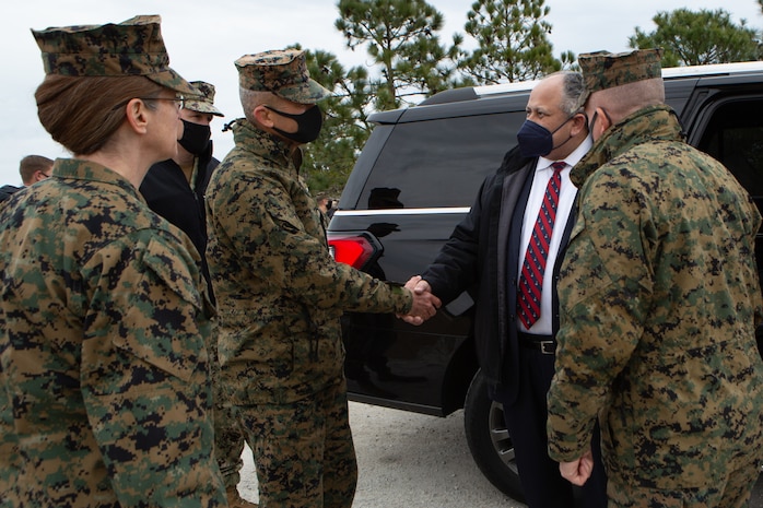 Secretary of the Navy Carlos Del Toro, right, shakes hands with U.S. Marine Corps Brig. Gen. Andrew M. Niebel, left, commanding general of MCIEAST-Marine Corps Base Camp Lejeune (MCB Camp Lejeune), while departing range G-36 on MCB Camp Lejeune, North Carolina, Jan. 28, 2022. The Secretary of the Navy toured MCB Camp Lejeune to visit II Marine Expeditionary Force and Lejeune Memorial Gardens and viewed the ongoing construction improvements, public private venture housing and hurricane recovery progress on the installation. (U.S. Marine Corps photo by Lance Cpl. Antonino Mazzamuto)