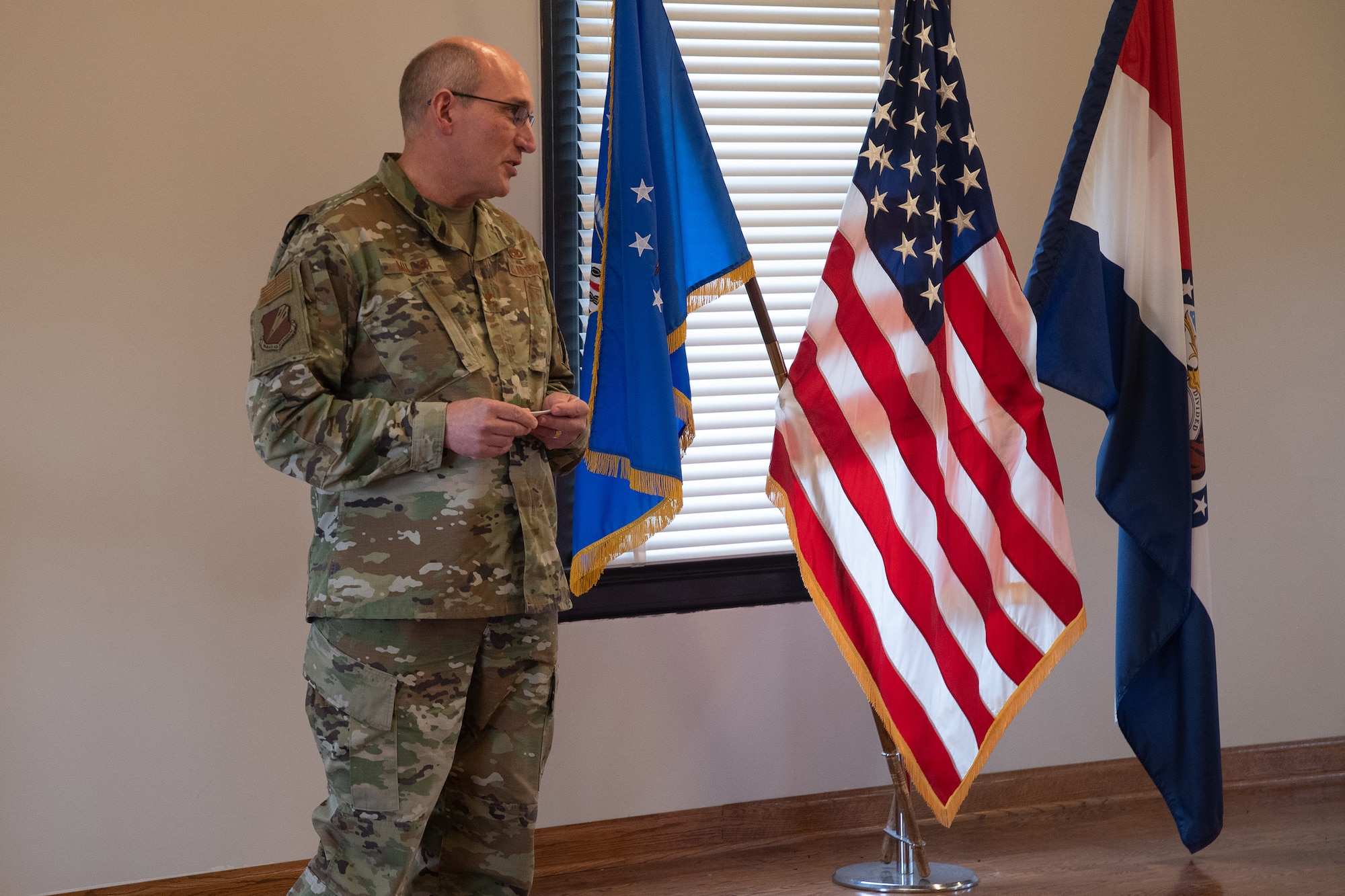 Col. William Miller, adresses the crowd after he assumes command of the 131st Bomb Wing Mission Support Group at Jefferson Barracks Air National Guard Base, St. Louis, Missouri, Jan 9, 2022. Miller has almost 35 years experience in many positions, including leadership, in the Air Force. (U.S. Air National Guard photo by Airman 1st Class Whitney Erhart)