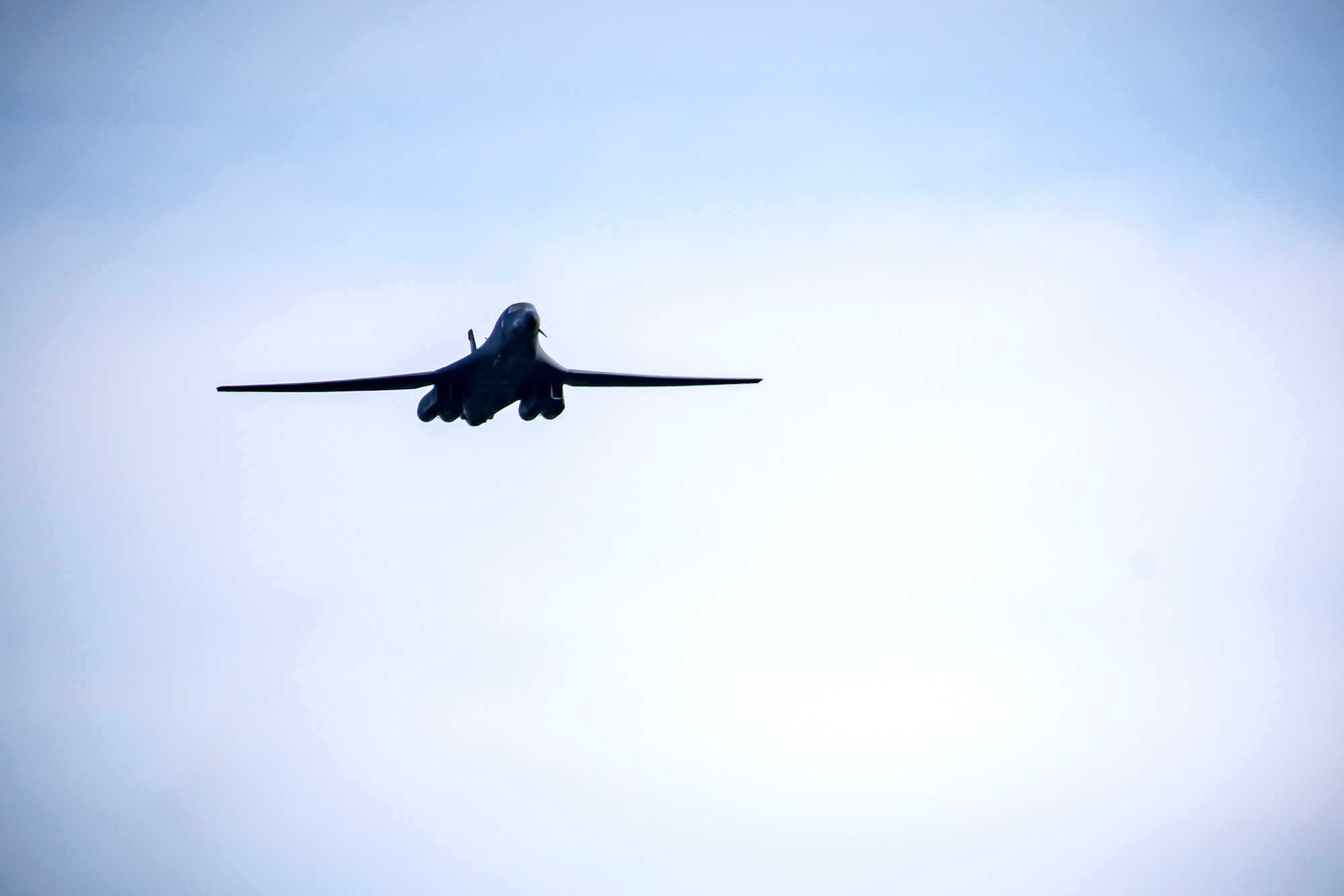 A U.S. Air Force B-1B lancer flies overhead at Duxford Airfield, England, Feb. 1, 2021. The flyover was in commemoration of the 80th anniversary of the Eighth Air Force. Events like these celebrate the continued USAF-RAF partnership and observe dissimilar US and RAF aircraft integrating on approach to Duxford Airfield. (U.S. Air Force photo by Senior Airman Eugene Oliver)